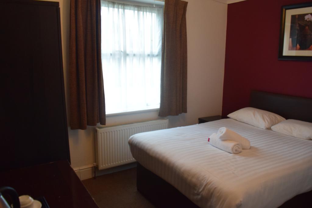 Citybest Hotel Ilford Ruang foto