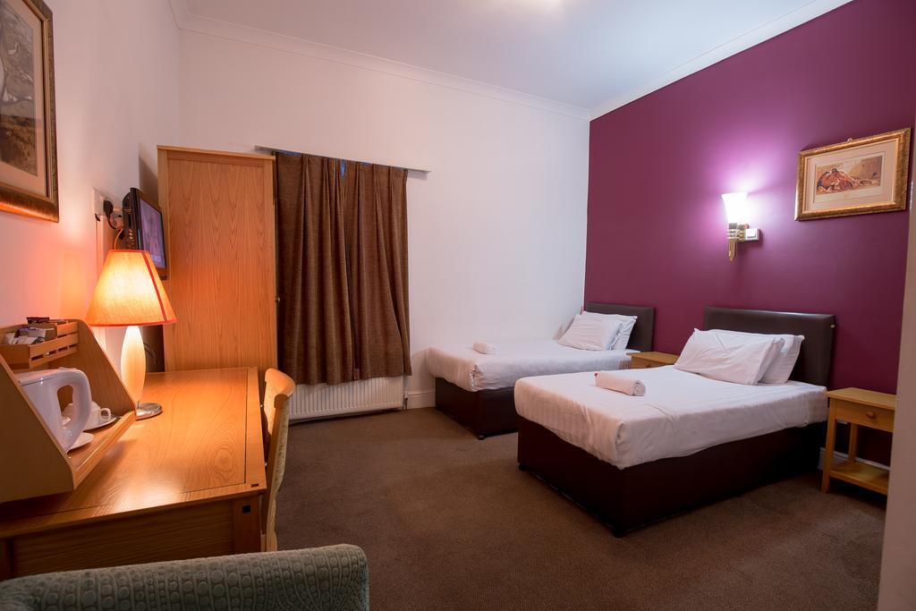 Citybest Hotel Ilford Ruang foto