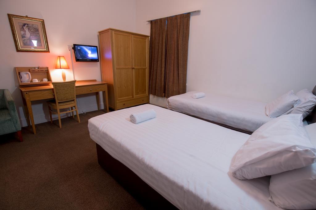 Citybest Hotel Ilford Ruang foto