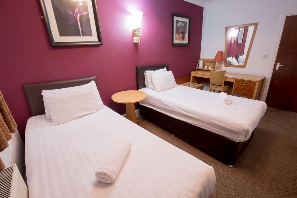 Citybest Hotel Ilford Ruang foto