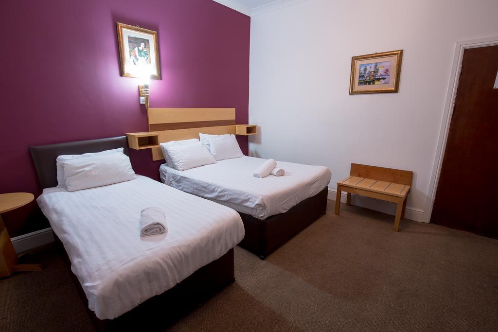Citybest Hotel Ilford Ruang foto